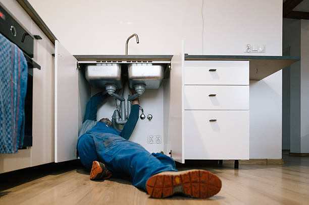 Professional Plumbing technician working in Brooke, VA